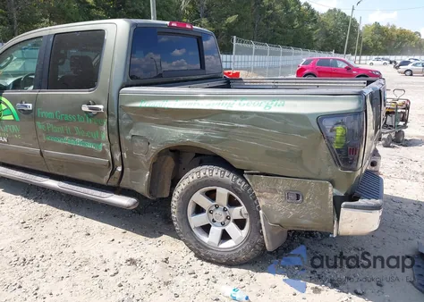 2005 Nissan Titan Le from USA, damaged, VIN 1N6BA07A05N520159